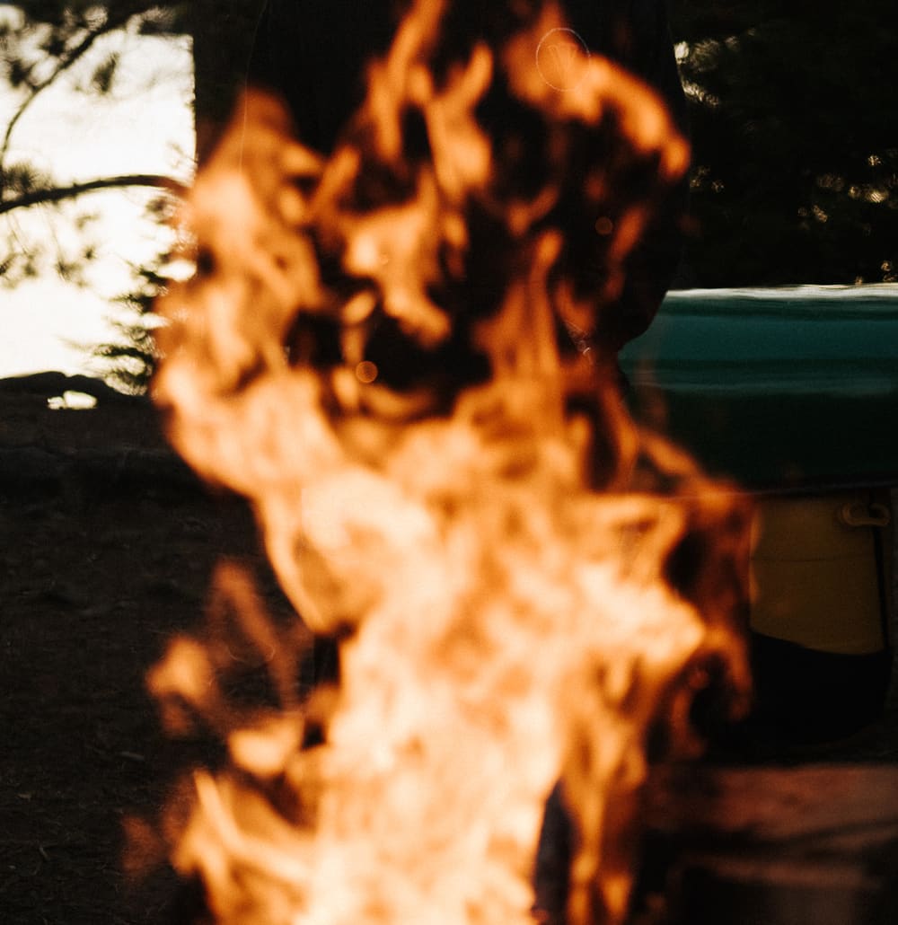 A campfire at dusk on the Algonquin Park retreat